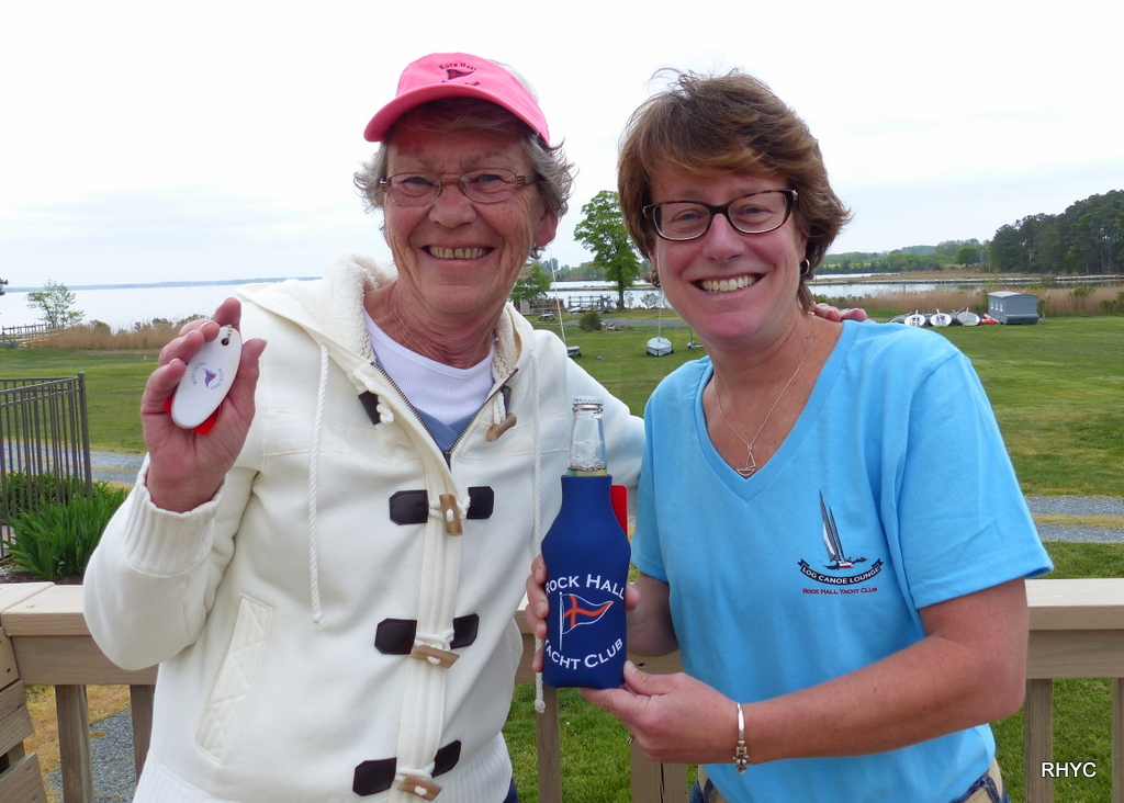 Connie and Kathy showing off various RHYC merchandise items